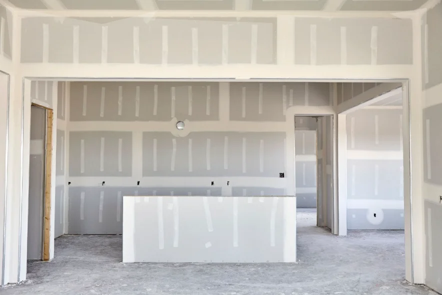 Interior buildout with new drywall partition walls and openings